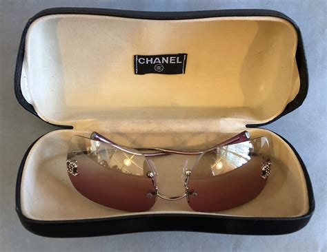 chanel black red glasses|Chanel rimless glasses.